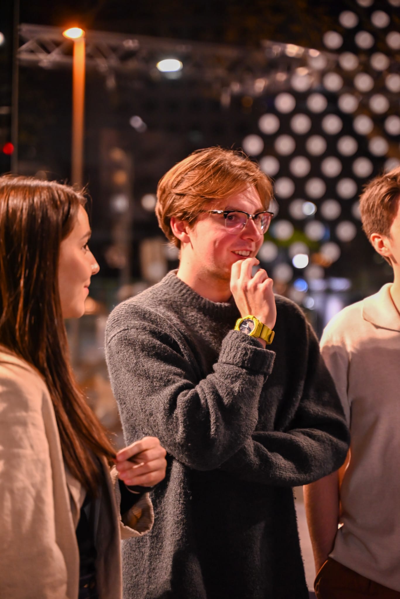 Santino Schrader smiling in a group of people